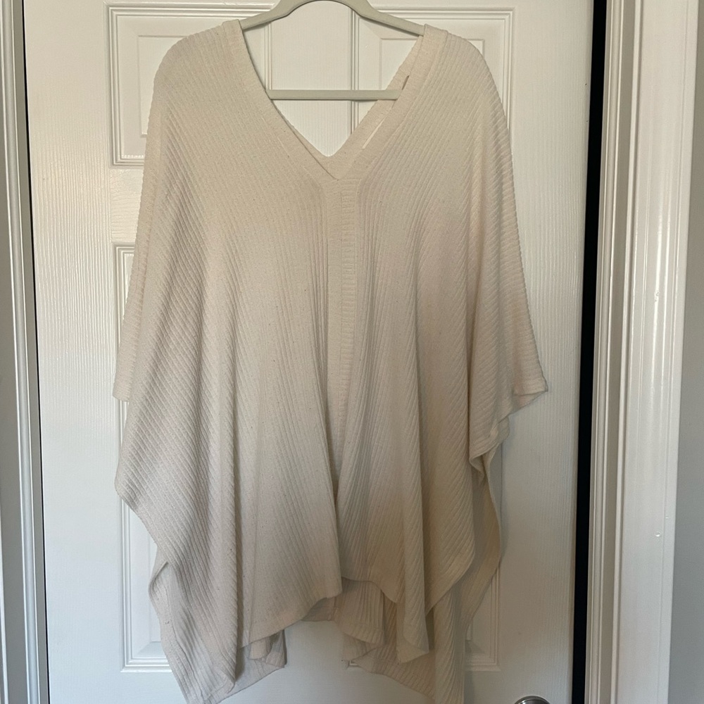 Cherish white poncho size small or medium.